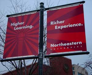 Photo: Northeastern University Flags Saying: Higher Learning... Richer Experience.